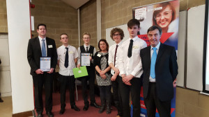 Image caption: Tim Puttick (far left), Production Manager for TDK-Lambda UK and Engineering Education Scheme (EES) mentor, presents Year 12 A-Level students from Ilfracombe Academy with their EES certificates
